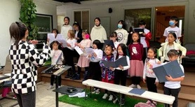 Young singers rehearsing at ICEA Choir's 2021 Winter Choir Camp