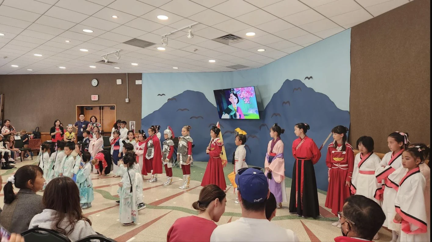 Cast of Legend of Mulan on stage